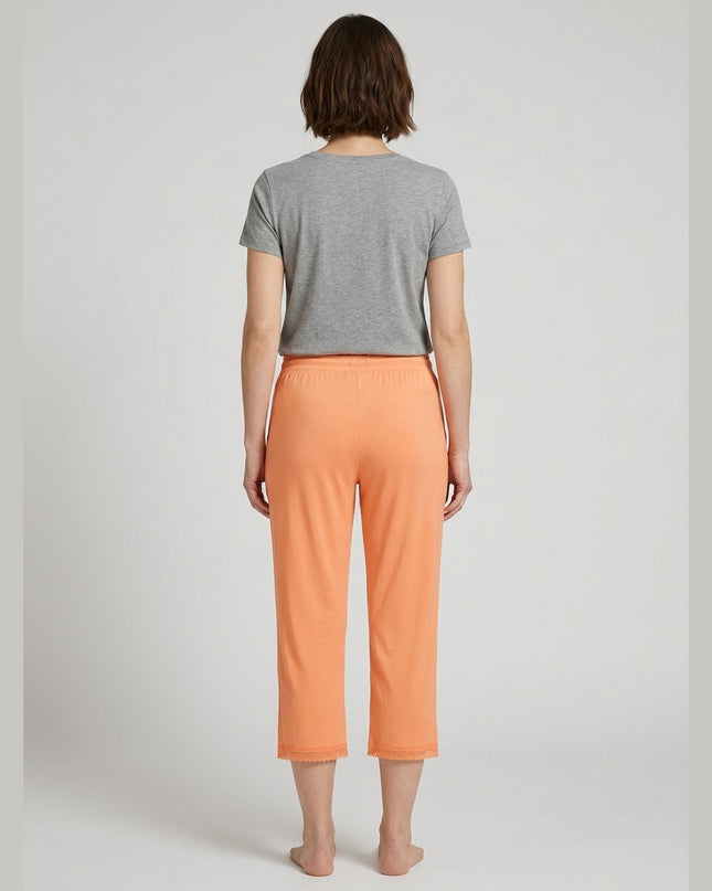 Pantallona Pizhame Kapri ngjyrë papaja për Femra - Model Back